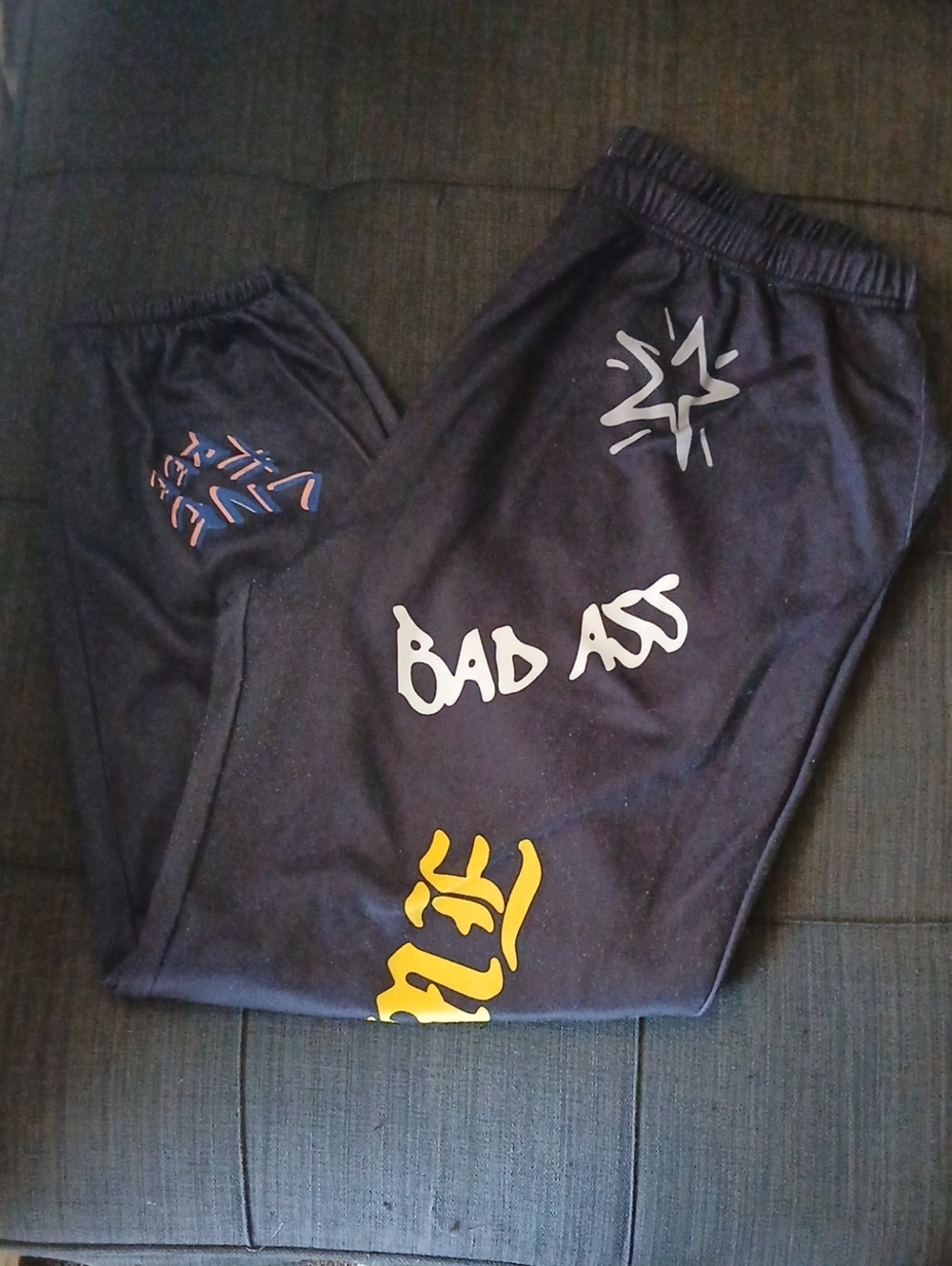 Black Graphic Track Joggers with 'Bad Ass' Script and Accent Prints